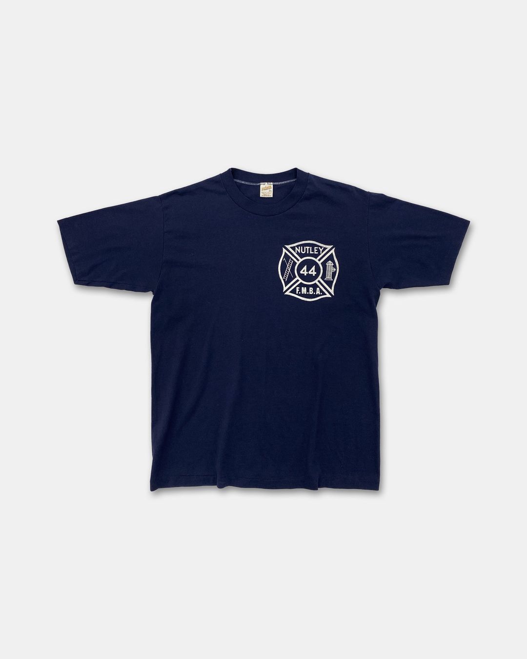 Vintage 1980s Nutley F.M.B.A. Fire-Fighter Single Stitched T-Shirt Navy by Vintage in size L from TOPS category