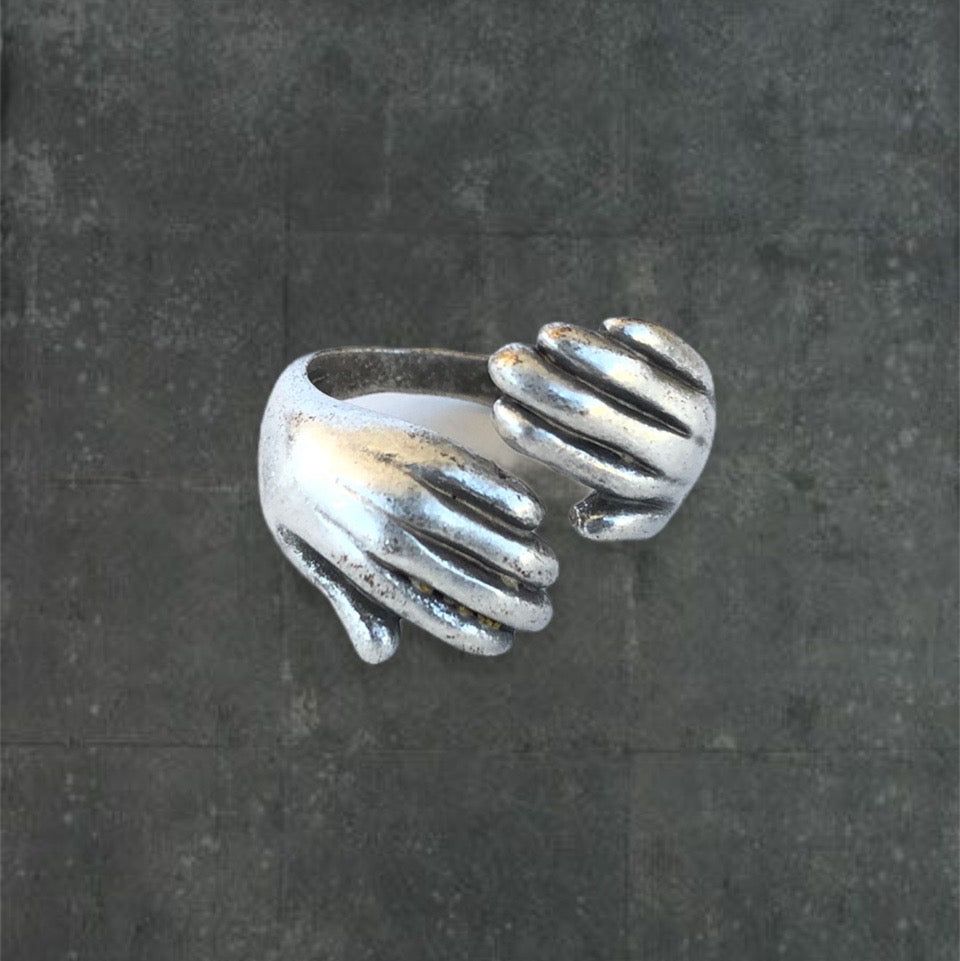 Hugged Hand Ring by FΛZED by Finn in size ONE SIZE
