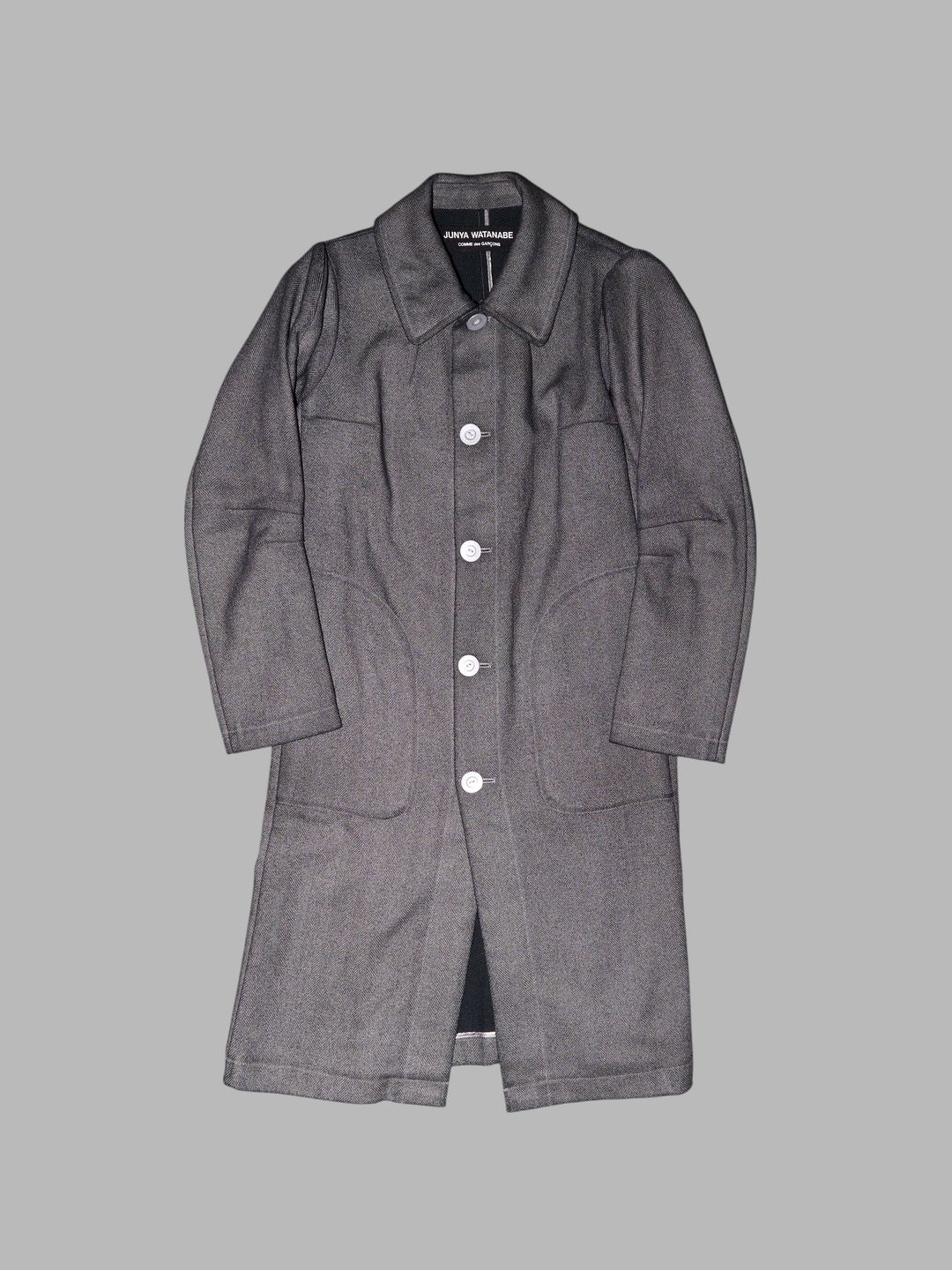 Junya Watanabe winter 1995 rigid grey poly herringbone three dimensional coat by JUNYA WATANABE in size ONE SIZE from COATS & JACKETS category