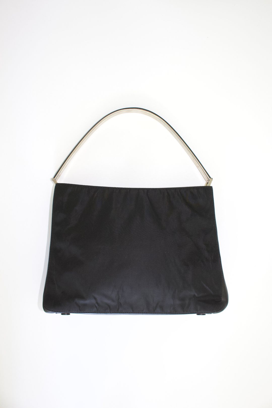 Prada FW 1998 black nylon shoulder bag with metal handle by PRADA in size ONE SIZE from BAGS category
