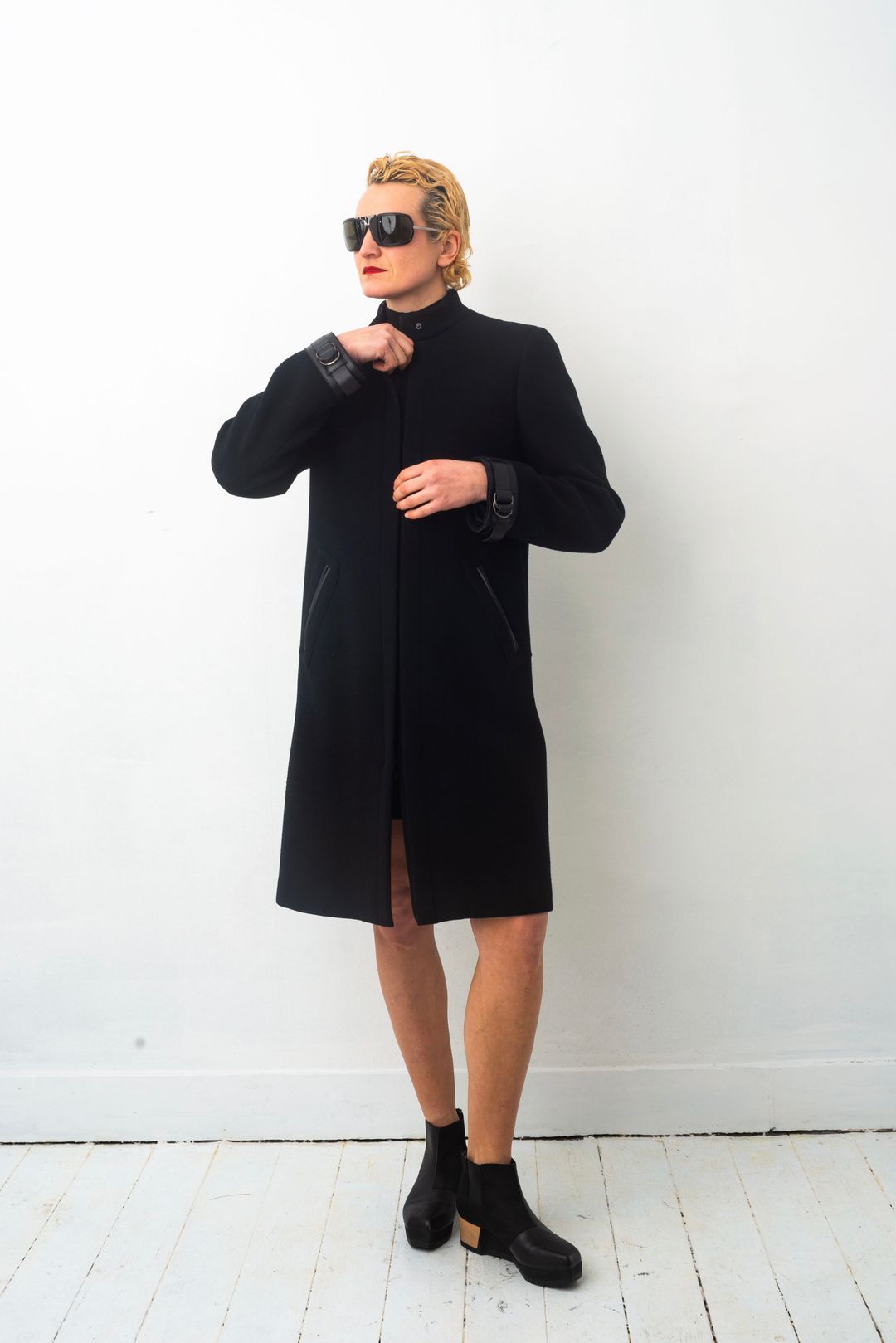 Prada FW 1999 black wool coat with leather details by PRADA in size IT 44 from COATS & JACKETS category