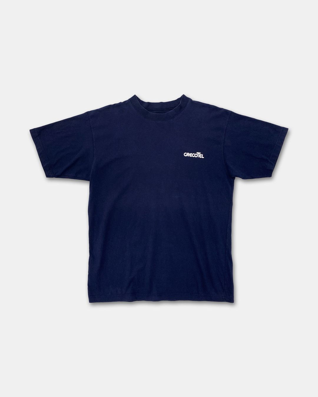 Vintage 2000s Grecotel Hotel T-Shirt Navy by Vintage in size ONE SIZE from TOPS category