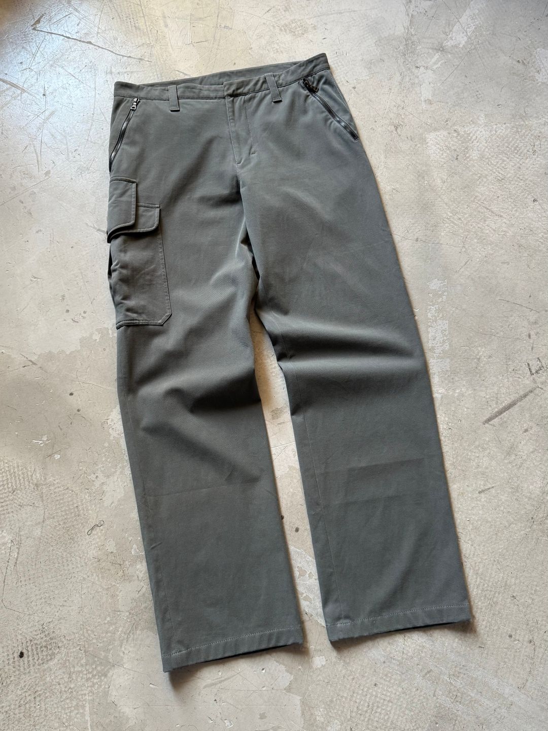 Prada Sport Asymmetrical Cargo Trousers by PRADA in size W34 from trousers category