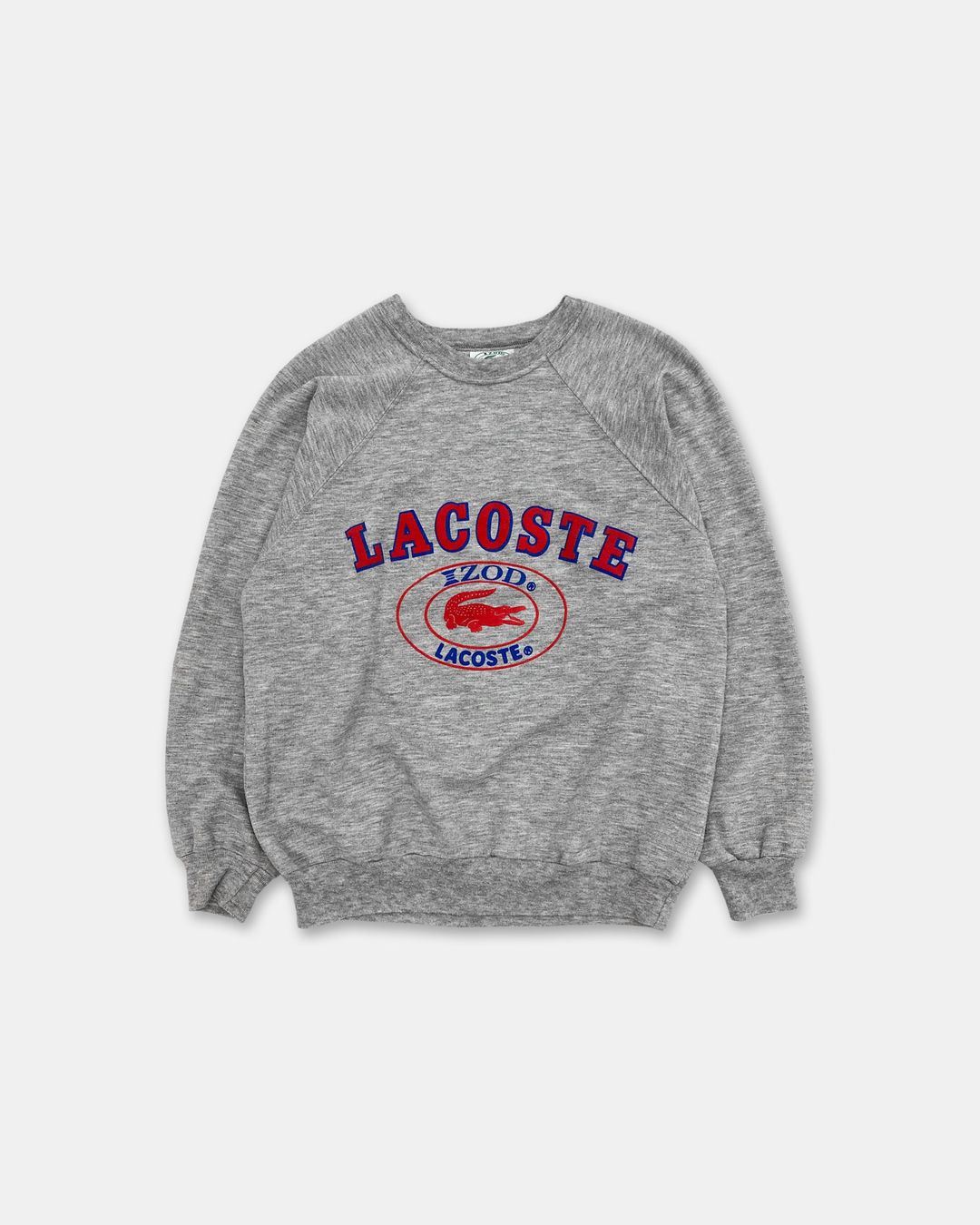 Lacoste Izod 1980s Raglan Logo Crewneck Heathergrey by Lacoste Izod in size ONE SIZE from KNITWEAR category