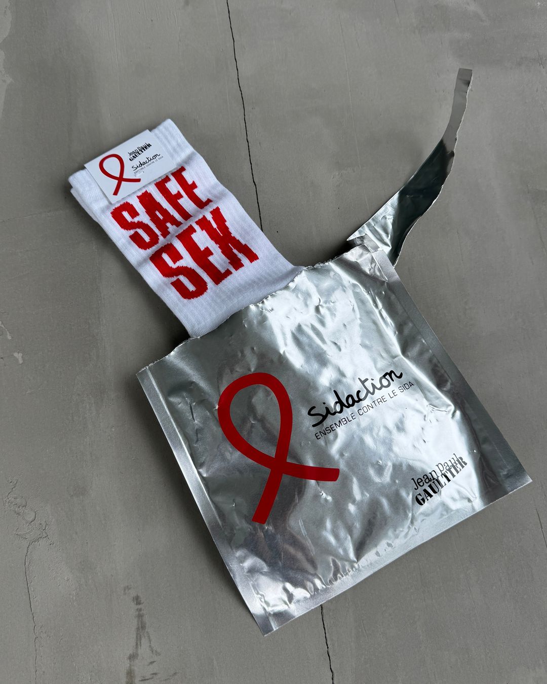 JEAN PAUL GAULTIER 'SAFE SEX FOR EVER' SOCKS by JEAN PAUL GAULTIER in size ONE SIZE from ACCESSORIES category