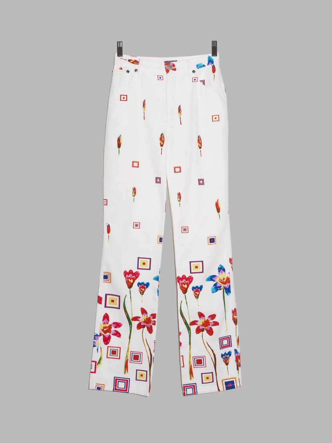 Byblos Blu 1990s white denim jeans with red floral and geometric print by Byblos Blu in size IT 40 from TROUSERS category