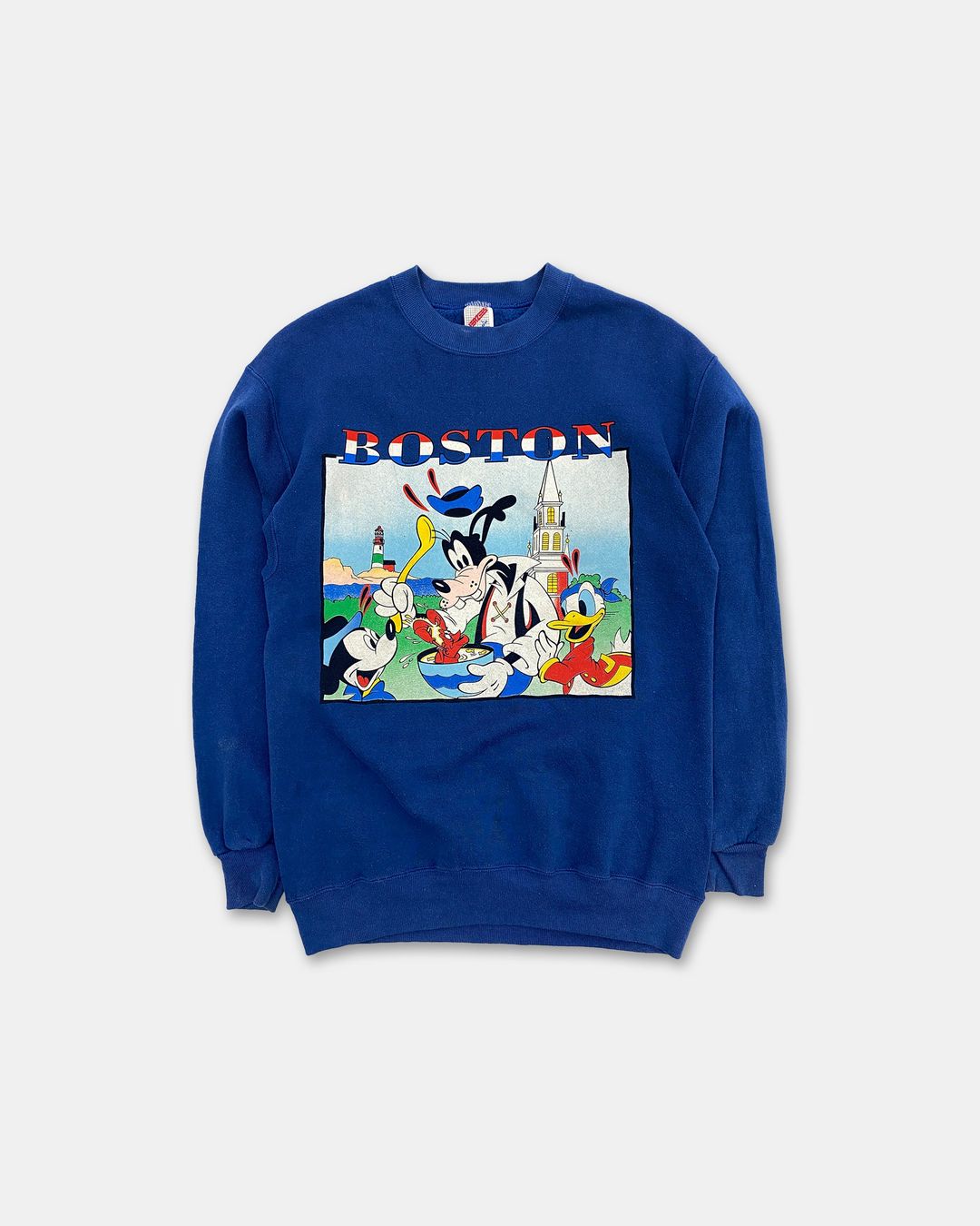 Vintage 1980s Made in USA Disney Boston Crewneck Blue by Vintage in size L from KNITWEAR category
