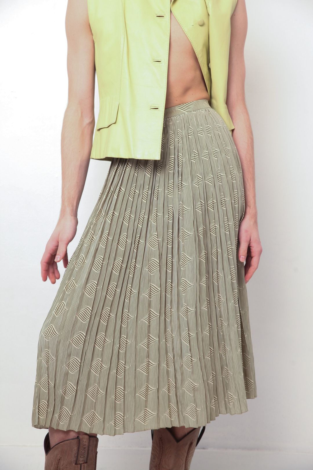 Pierre Cardin 1970's green pleated graphic print skirt by Pierre Cardin in size XXS from TROUSERS category