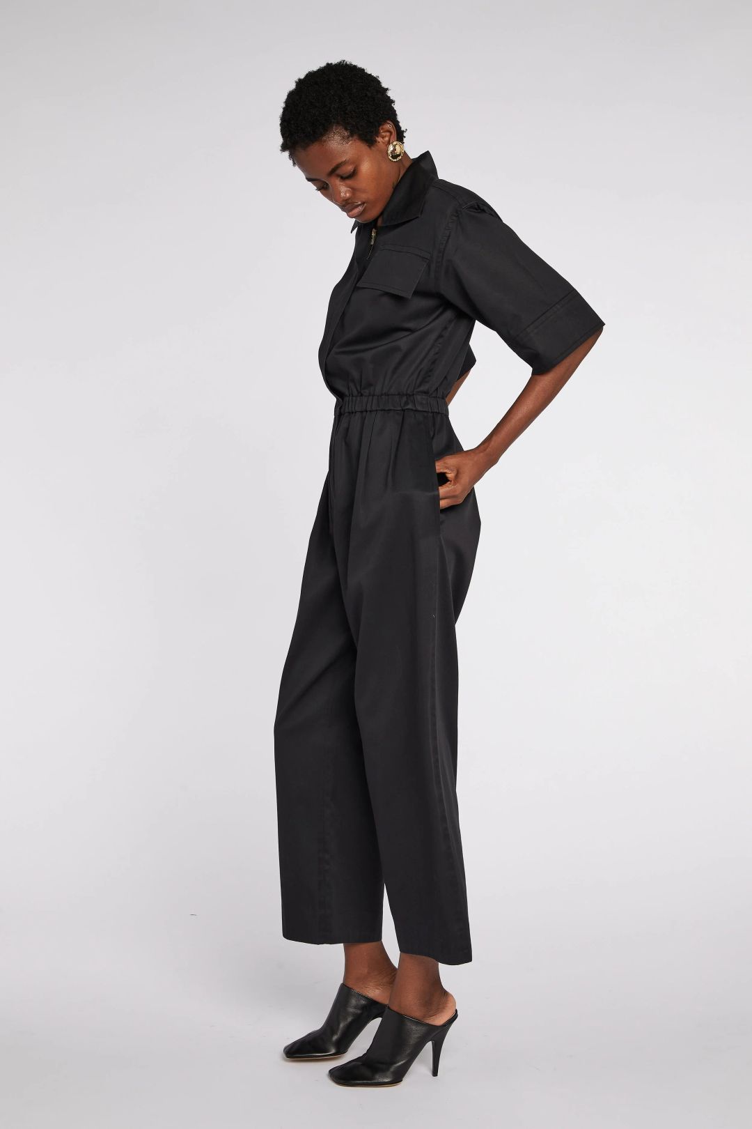 Saint Laurent Rive Gauche Black Short Sleeved Jumpsuit S/S 1985 by YVES SAINT LAURENT in size FR 36 from JUMPSUITS & PLAYSUITS category