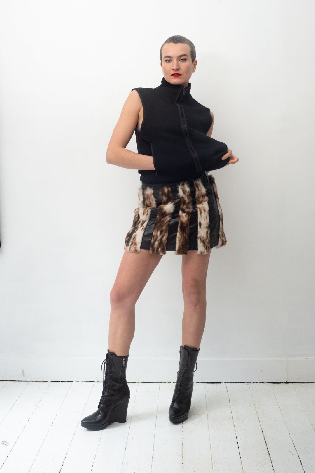 Versus Versace 90's leather and fur miniskirt by VERSACE in size XS from TROUSERS category