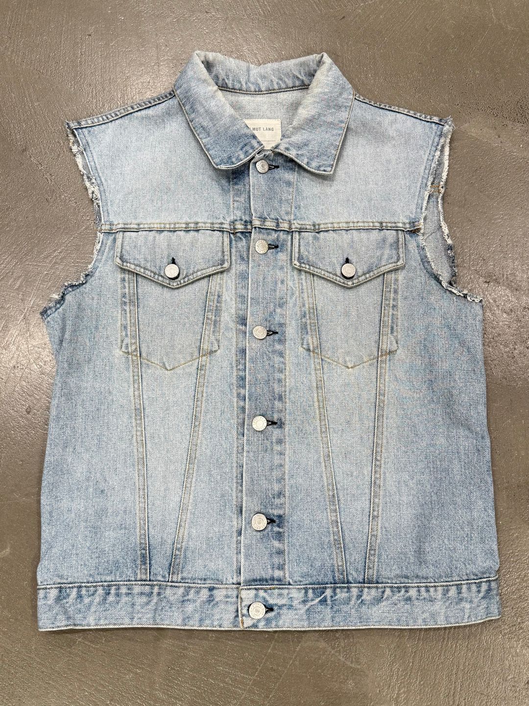 2000s Helmut Lang light wash raw edge denim vest by HELMUT LANG in size ONE SIZE from TOPS category