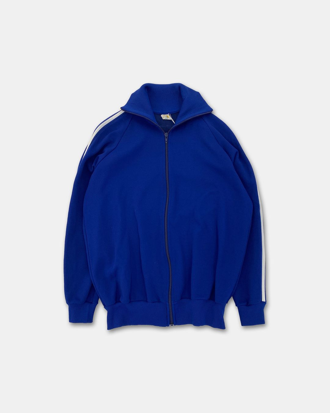 Vintage 1980s DDR Sport Track Jacket Blue by Vintage in size M from COATS & JACKETS category