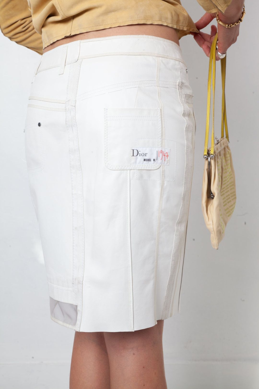 Dior 2000's white leather prototype pencil skirt with mesh detail by DIOR in size FR 40 from SKIRTS category