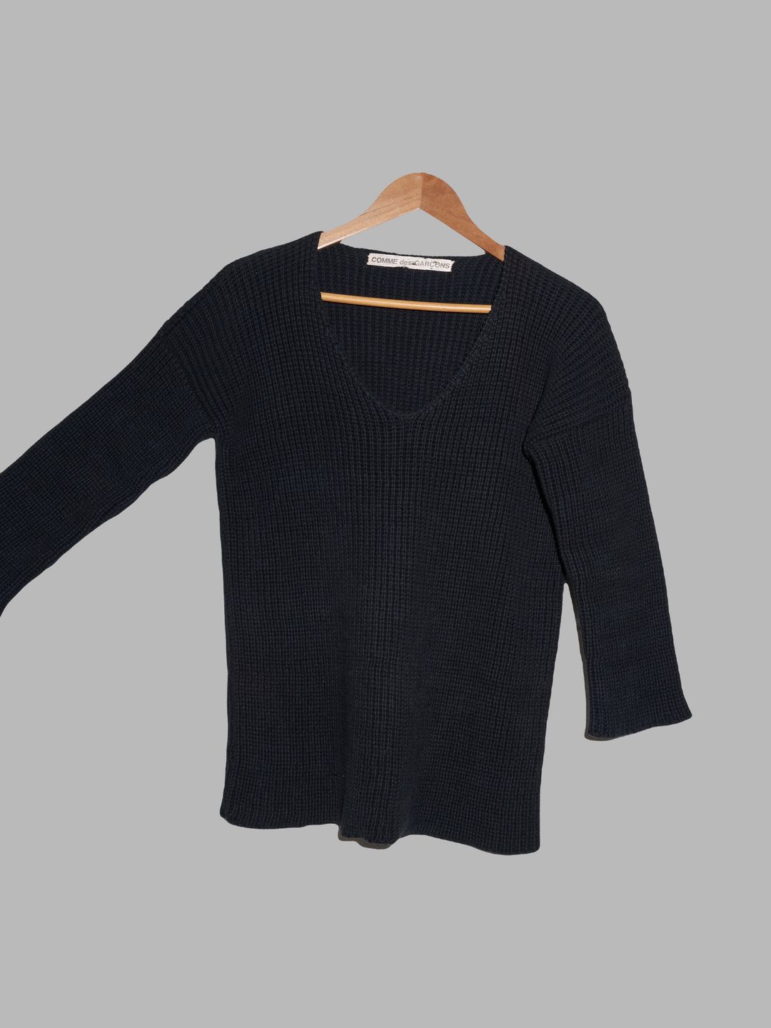 Comme des Garcons early 1980s black heavy cotton rib half sleeve v neck jumper by COMME DES GARÇONS in size S from KNITWEAR category