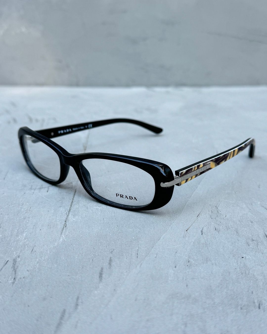 Prada Clear Lens “Bayonetta” Eye Glasses by PRADA in size ONE SIZE from ACCESSORIES category