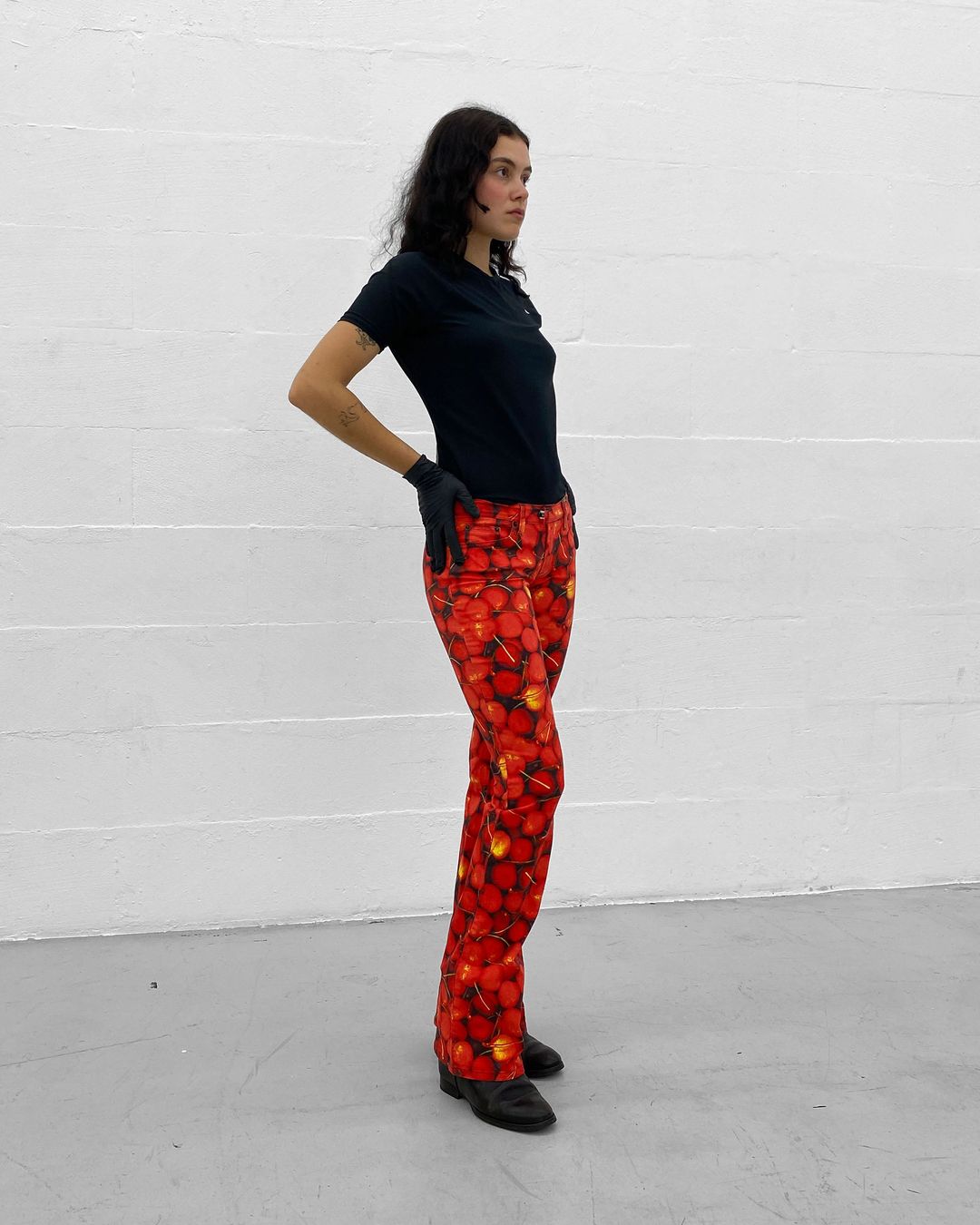 Dolce & Gabbana 2000s Cherry All Over Print Flared Pants Red by DOLCE & GABBANA in size W26 from TROUSERS category