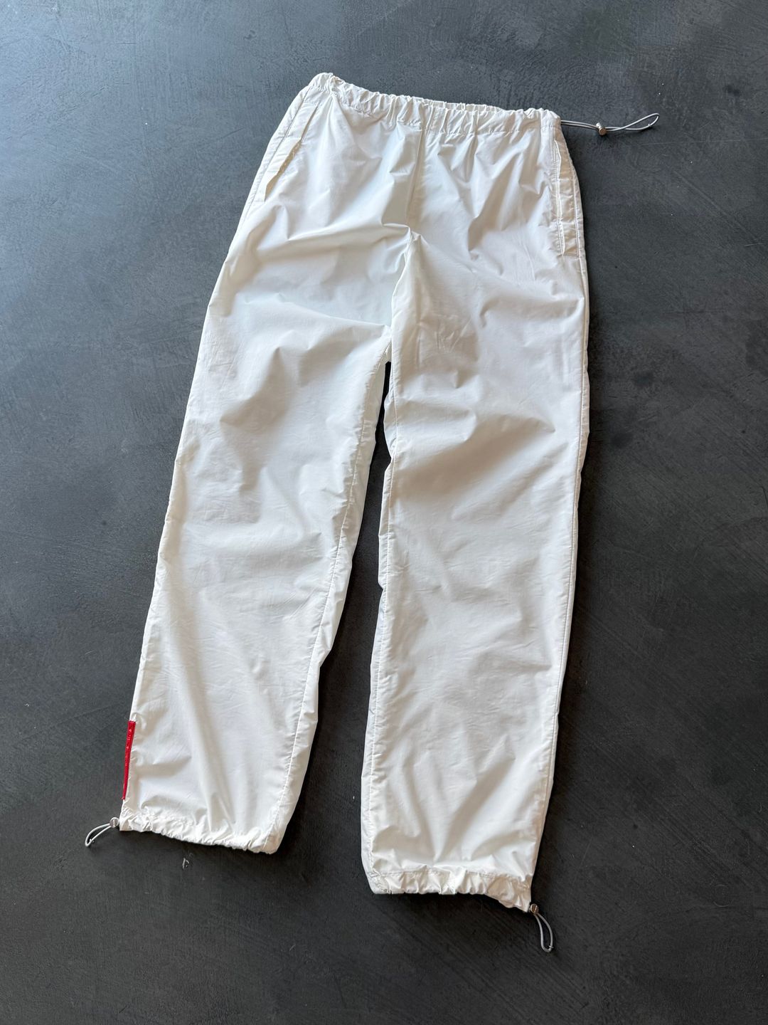 FW 99 Prada Sport Parachute Pants by PRADA in size W26 from trousers category