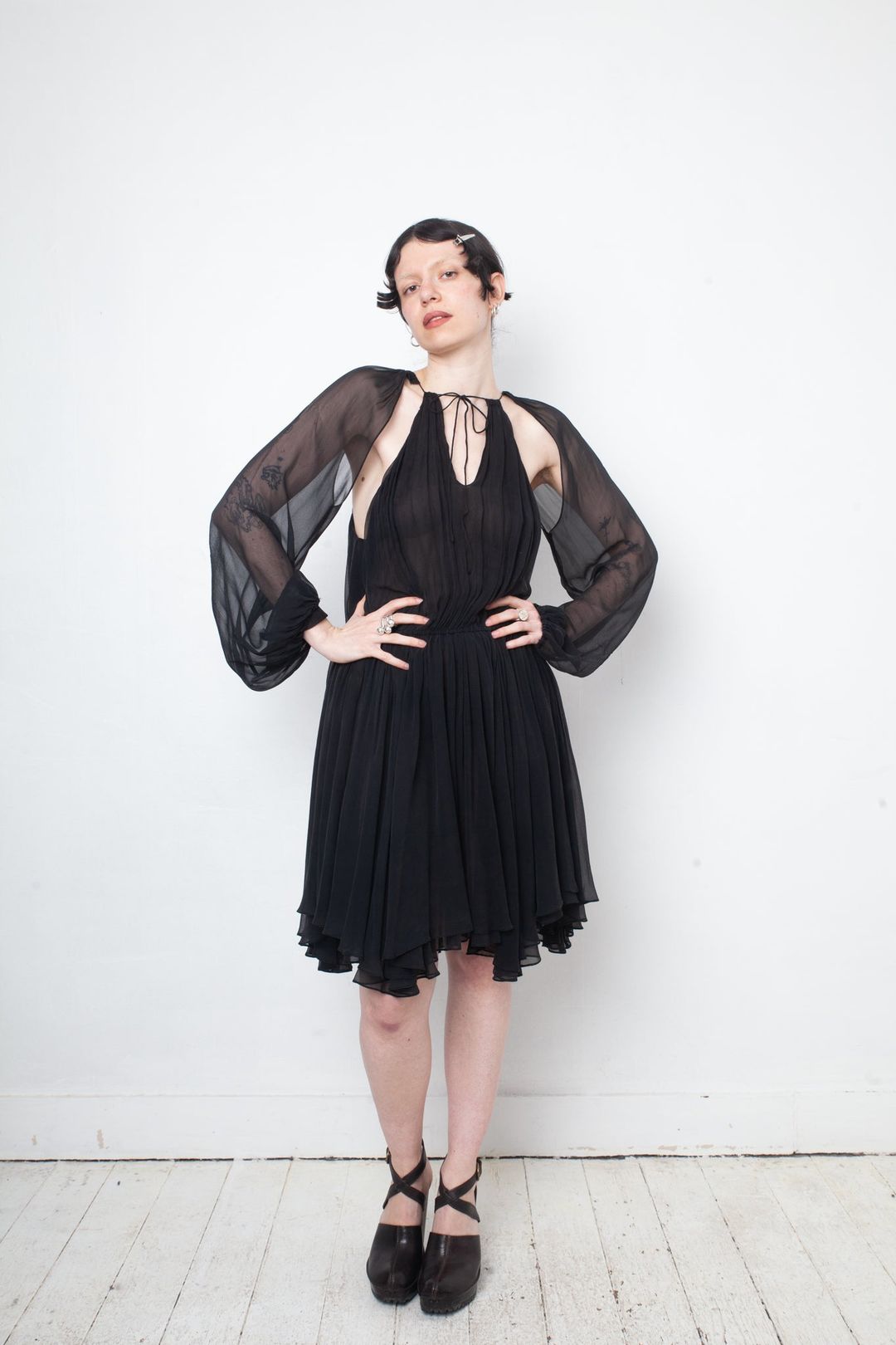 No Label Black silk babydoll pleated dress with sheer balloon sleeves by undefined in size S from DRESSES category